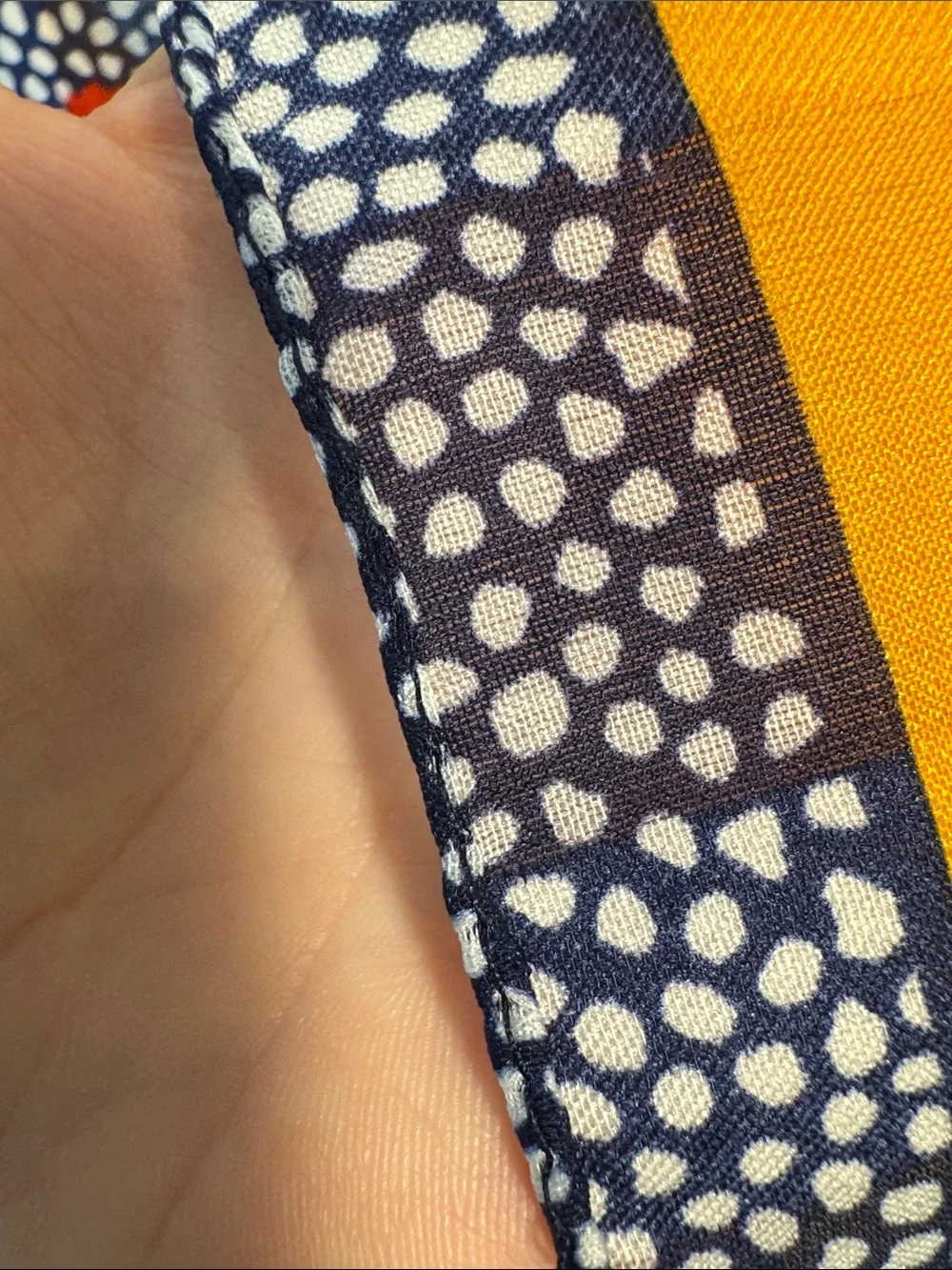 Navy, yellow, and red square poly floral scarf.